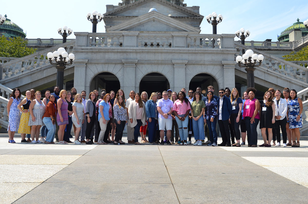 group of people in front of PA capitol building