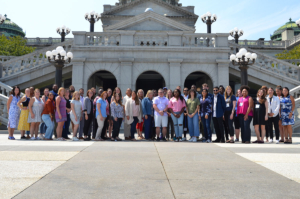 group of people in front of PA capitol building